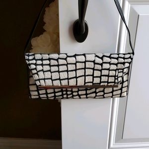 Kate Landry Black and cream clutch